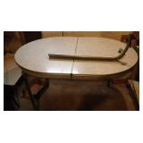 retro style table leg needs some repair, top is in nice condition