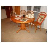 very nice dining table with 4 chairs and 1 leaf
