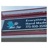 Originally sign above the museum storefront