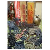 Tons of antique trivets and sad iron stands.