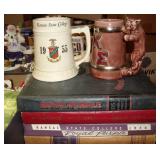 K-State vintage yearbooks and ceramic mugs