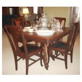 Table includes 6 chairs and 3 leaves