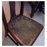 Tooled leather seat chairs