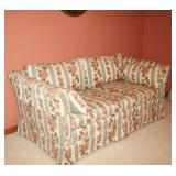 Floral loveseat in excellent condition