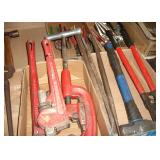 Loads of tools, including pipe wrenches