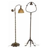 Tiffany bronze floor lamps, one counter-balance form with original linenfold shade