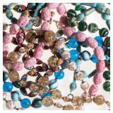 100s of glass-bead necklaces