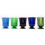 Many rare colored spooners/spill holders