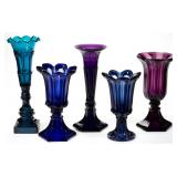 More than 50 colored vases