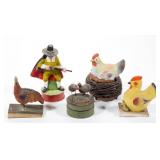 Good selection of antique/vintage candy containers and squeak toys