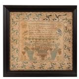 One of over 50 needlework samplers from the Vail estate