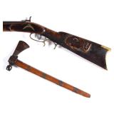 Fine Plains tomahawk and unusual carved and inlaid longrifle, from a good selection of early firearm