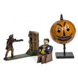 Rare mechanical banks and a circa 1900 folk art paint-decorated tin parade jack-o-lantern,... 
