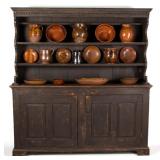 American, possibly Virginia, painted yellow pine and oak pewter cupboard and a selection of...