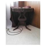 table w/ musical lyre