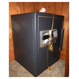 Safe with key and code entry