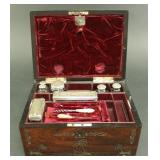 Lot 151: 9-Piece Traveling Kit with Sterling Silver Covers 