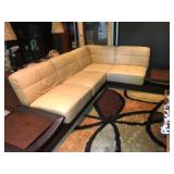 Modern leather sofa with floating end tables