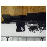 Group of Laptops and Portable DVD Players 