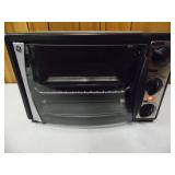 Working GE Stainless Steel Table Top Oven - current bid $15
