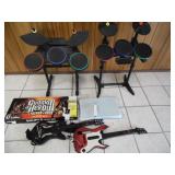 Group of Guitar Hero & Wii Game Accessories - current bid $10