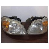 Pair of Chevy Headlights - current bid $10