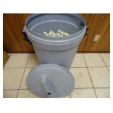 Trash can with 100s of Golf Balls