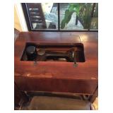 Old Singer sewing machine and table