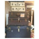 Assorted trunks and luggage