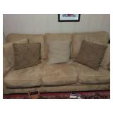 Suede sofa and pillows