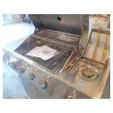Nexgrill 4-Burner Propane Gas Grill in Stainless Steel with Side Burner and Stainless Steel Doors