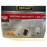 Defiant 180° White Solar Powered Motion LED Security Light with Battery Backupin good conditions