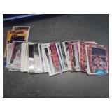 Binder and Stack of Basketball Cards - Stars and Vintage