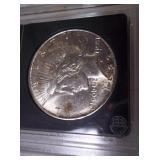 1922 Graded Peace Dollar in Case. MS67