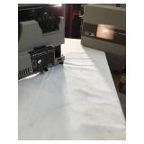 Vintage Kodak instamatic M105 movie projector with box