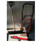 Hand Cart, Shovel, And a Telescope