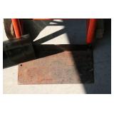 Hand Cart, Shovel, And a Telescope