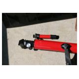 Hand Cart, Shovel, And a Telescope