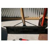 Hand Cart, Shovel, And a Telescope