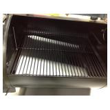 Traeger Eastwood 22 Wood Pellet Grill and Smoker in Silver Vein Model # TFB42DVBO not used whit damage please review photos
