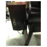 Traeger Eastwood 22 Wood Pellet Grill and Smoker in Silver Vein Model # TFB42DVBO not used whit damage please review photos