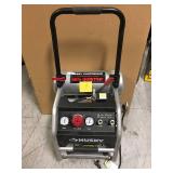 Husky 4.5 Gal. Portable Electric-Powered Silent Air Compressor in good condition