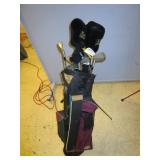 TITLEIST AND HIGHLAND GOLF CLUB BAGS WITH CLUBS