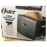 Oster 2-Slice Toaster with Retractable Cord in good condition