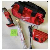 Milwaukee lot- Untested AS IS - LED Work light,  battery charger, saw blades and carry case