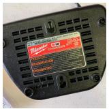 Milwaukee lot- Untested AS IS - LED Work light,  battery charger, saw blades and carry case