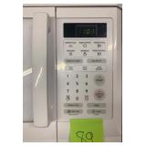 1.6 cu. Ft. over-the-range- microwave oven- White, missing turn table and hardware
