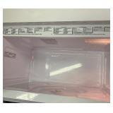 1.6 cu. Ft. over-the-range- microwave oven- White, missing turn table and hardware