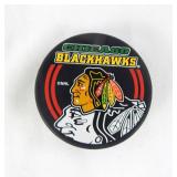 Lot of Buffalo Sabres and Chicago Blackhawks NHL Team Pucks