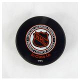 Lot of Buffalo Sabres and Chicago Blackhawks NHL Team Pucks
